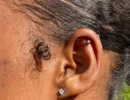 Elegant Center (Piercing, détatouage, Carbon Peel, Strass Dentaire)